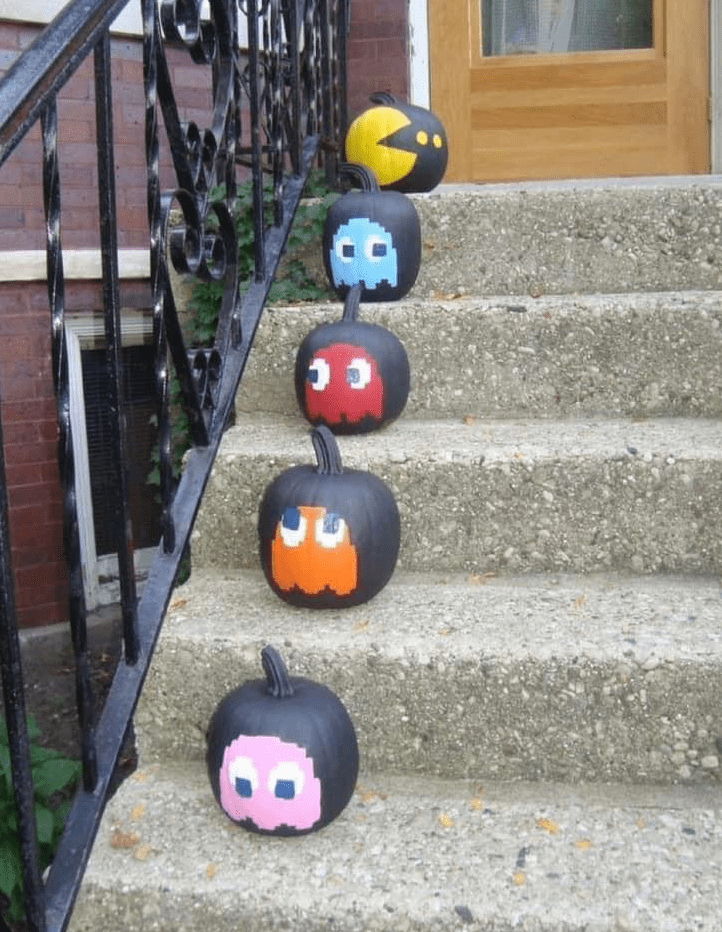 No-Carve Halloween! 30+ Easy Pumpkin Painting Ideas for All Ages 12 Pac-Man Pumpkin Painting Idea
